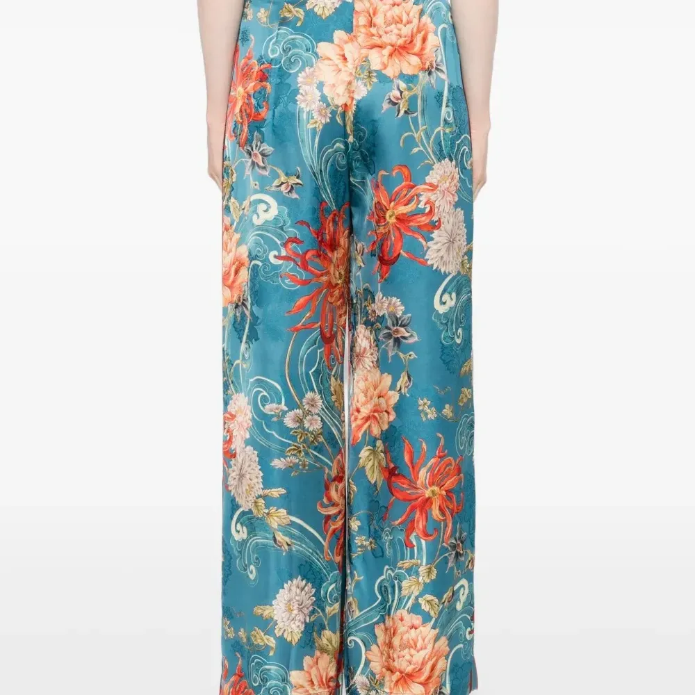 Брюки с цветочным принтом Брюки с цветочным принтом