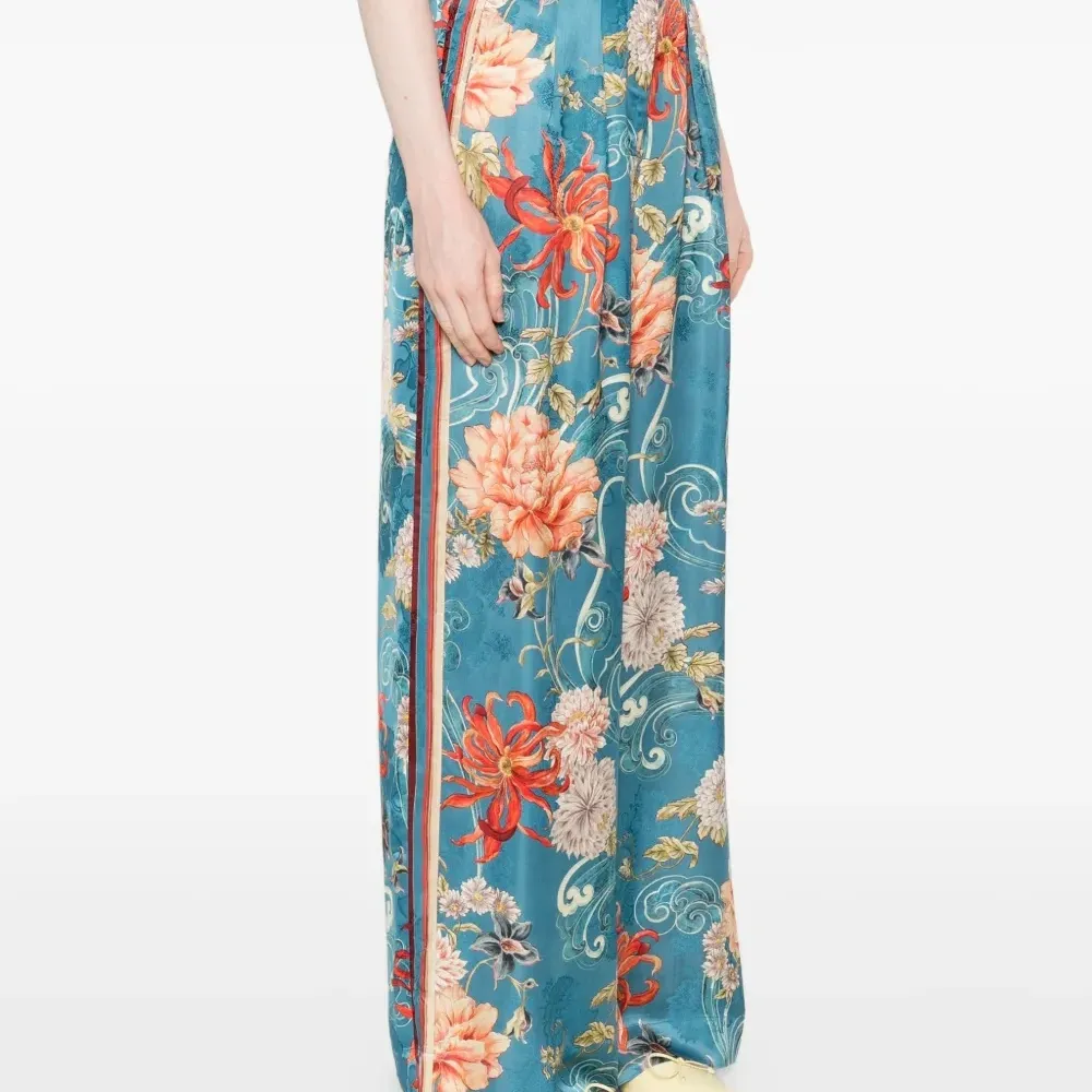 Брюки с цветочным принтом Брюки с цветочным принтом