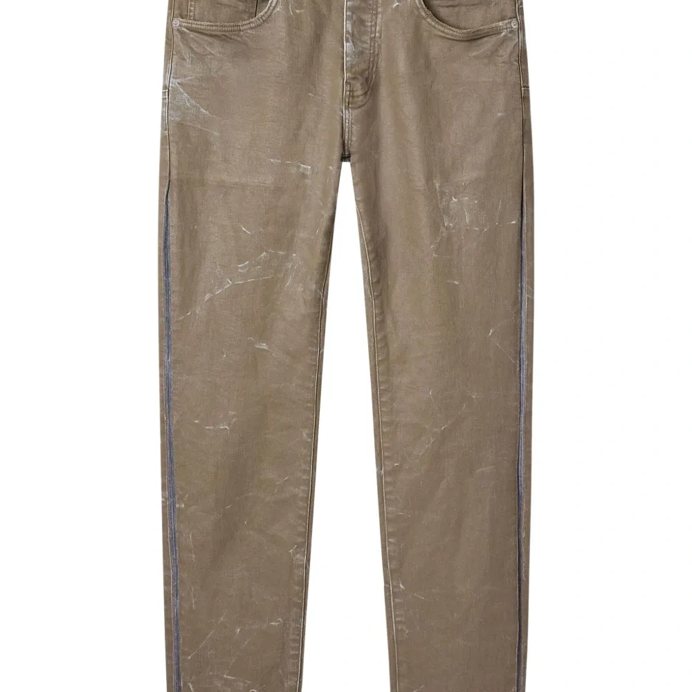 Джинсы с эффектом потертости