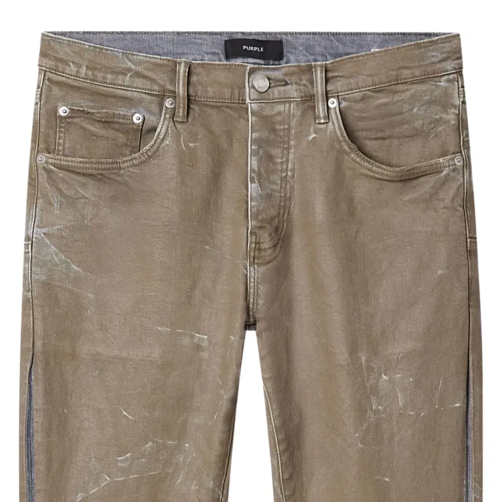 Джинсы с эффектом потертости