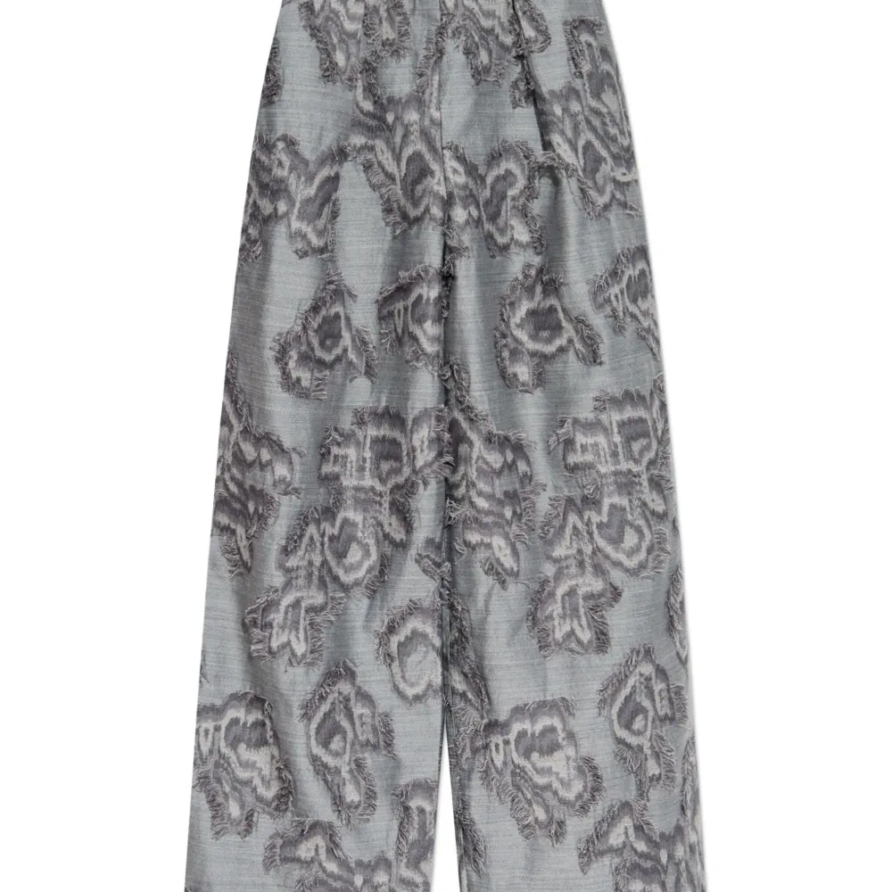 Брюки палаццо с бахромой