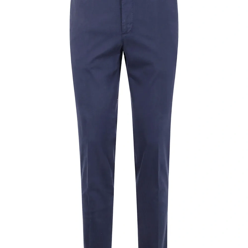 брюки с карманами