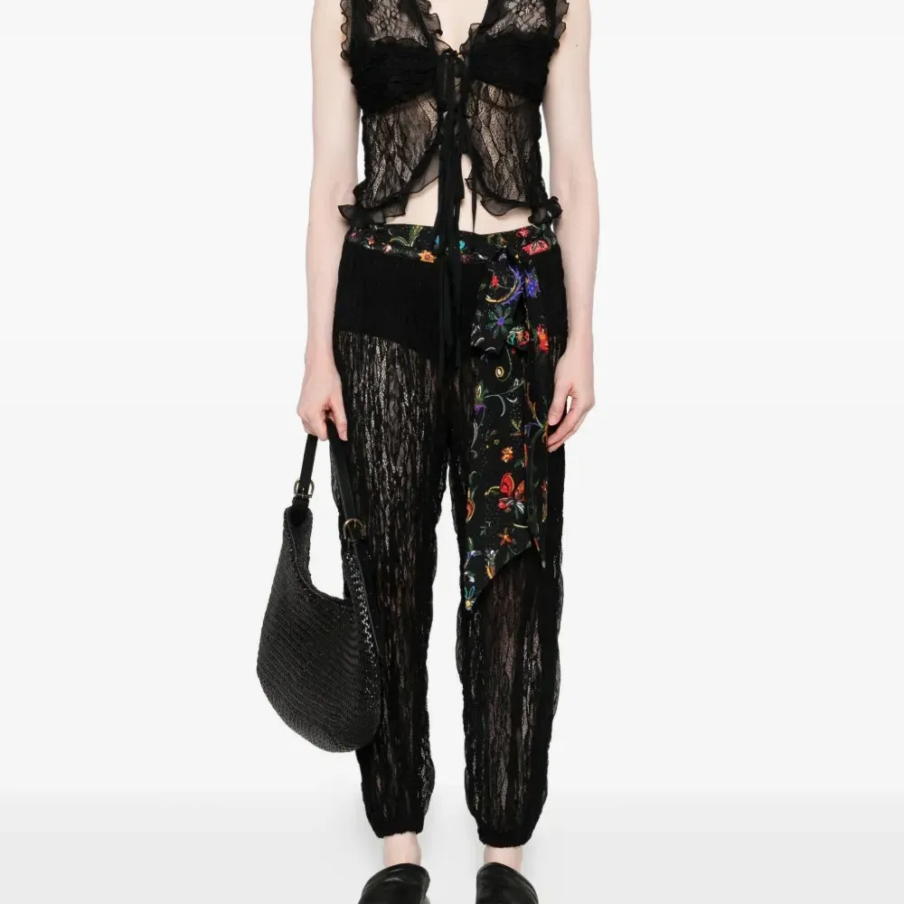 Брюки с цветочным принтом Брюки с цветочным принтом