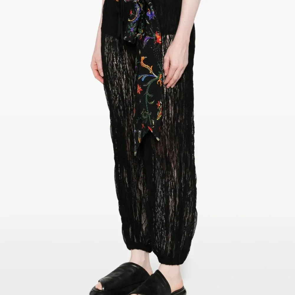 Брюки с цветочным принтом Брюки с цветочным принтом