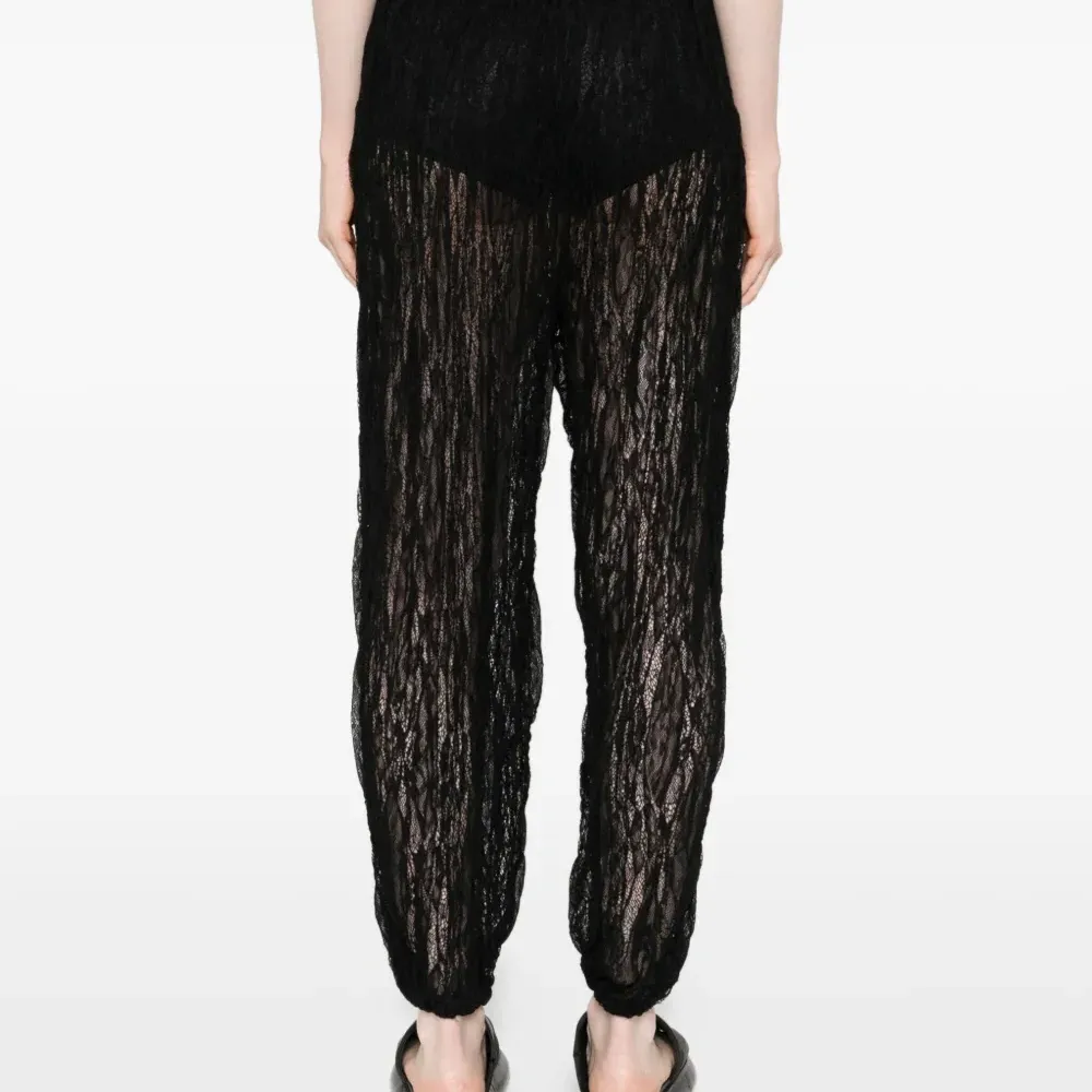 Брюки с цветочным принтом Брюки с цветочным принтом