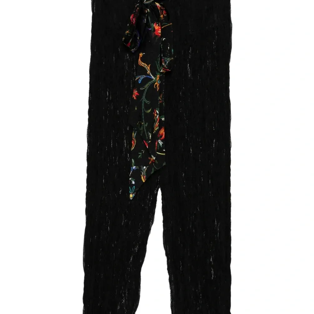 Брюки с цветочным принтом Брюки с цветочным принтом