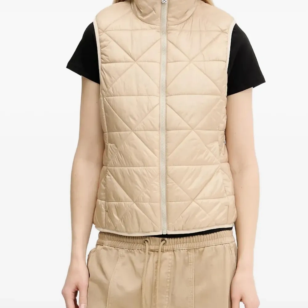 Стеганый жилет