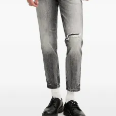 Джинсы с эффектом потертости