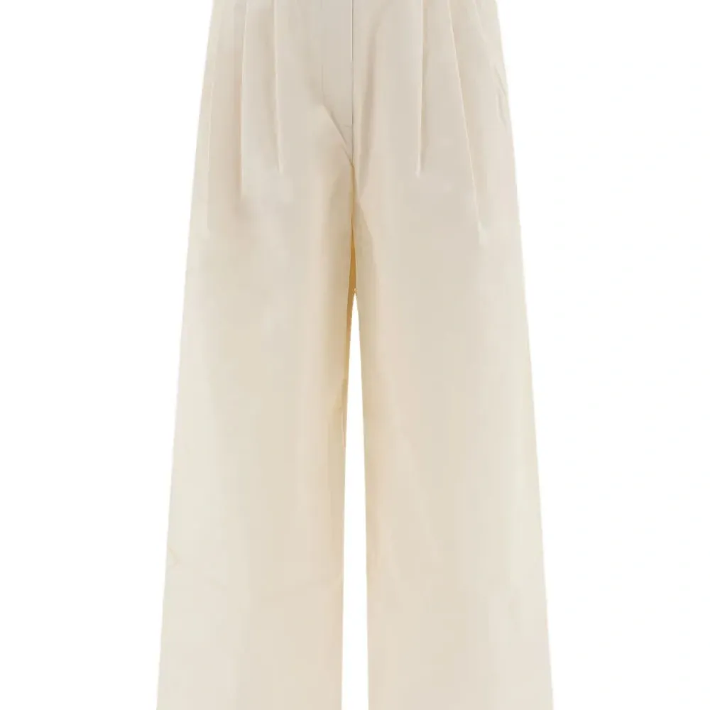 Брюки со складками