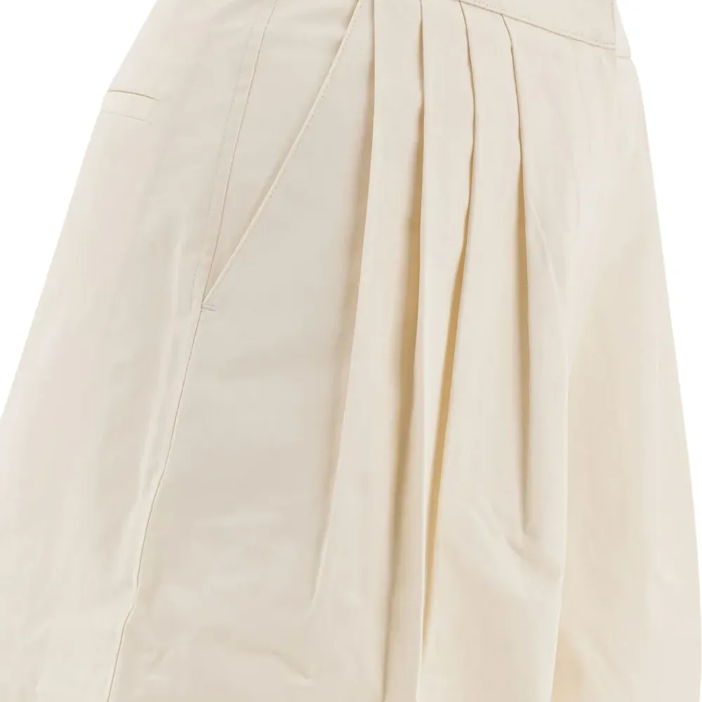 Брюки со складками