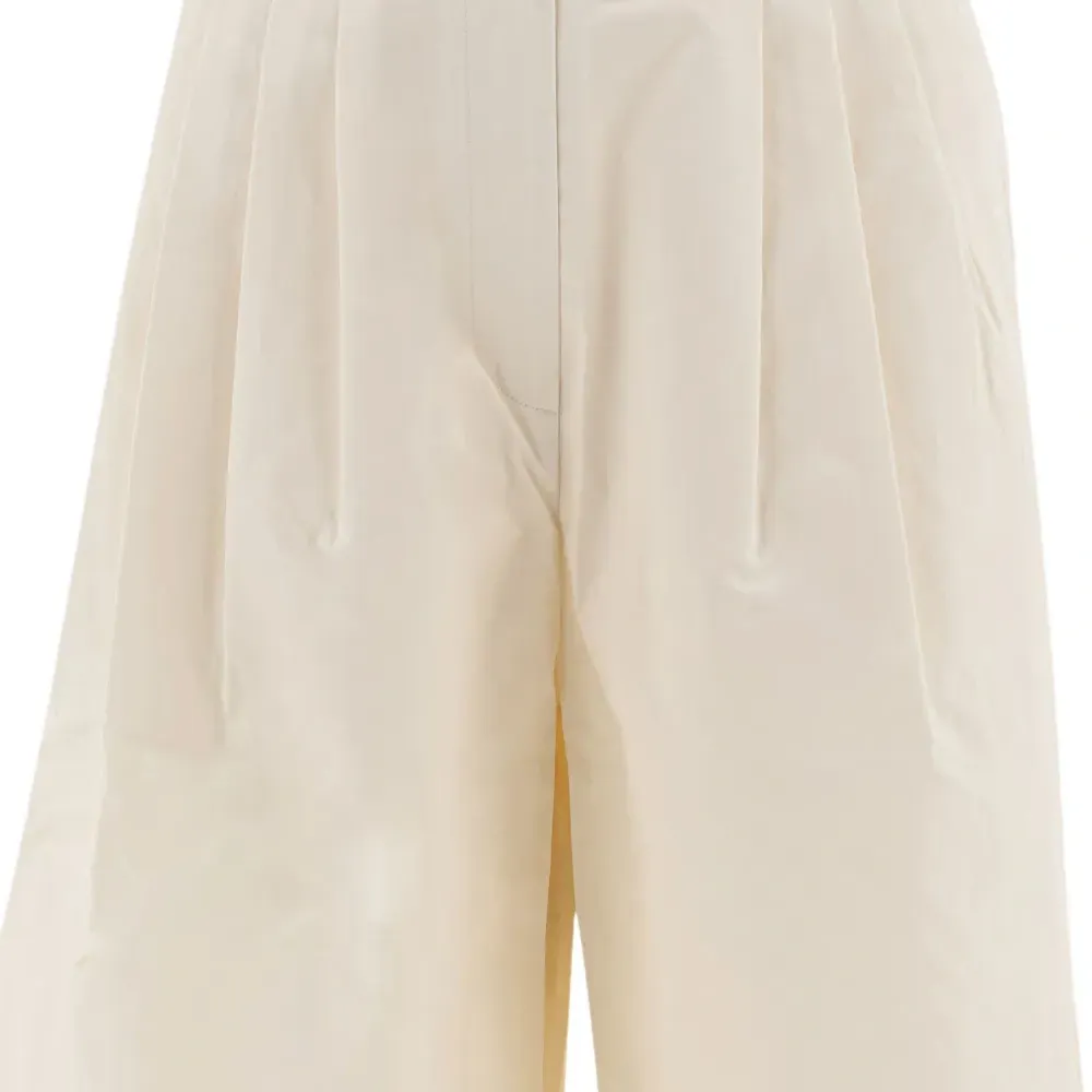 Брюки со складками