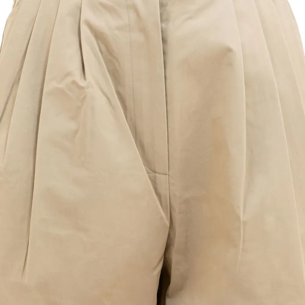 Брюки со складками