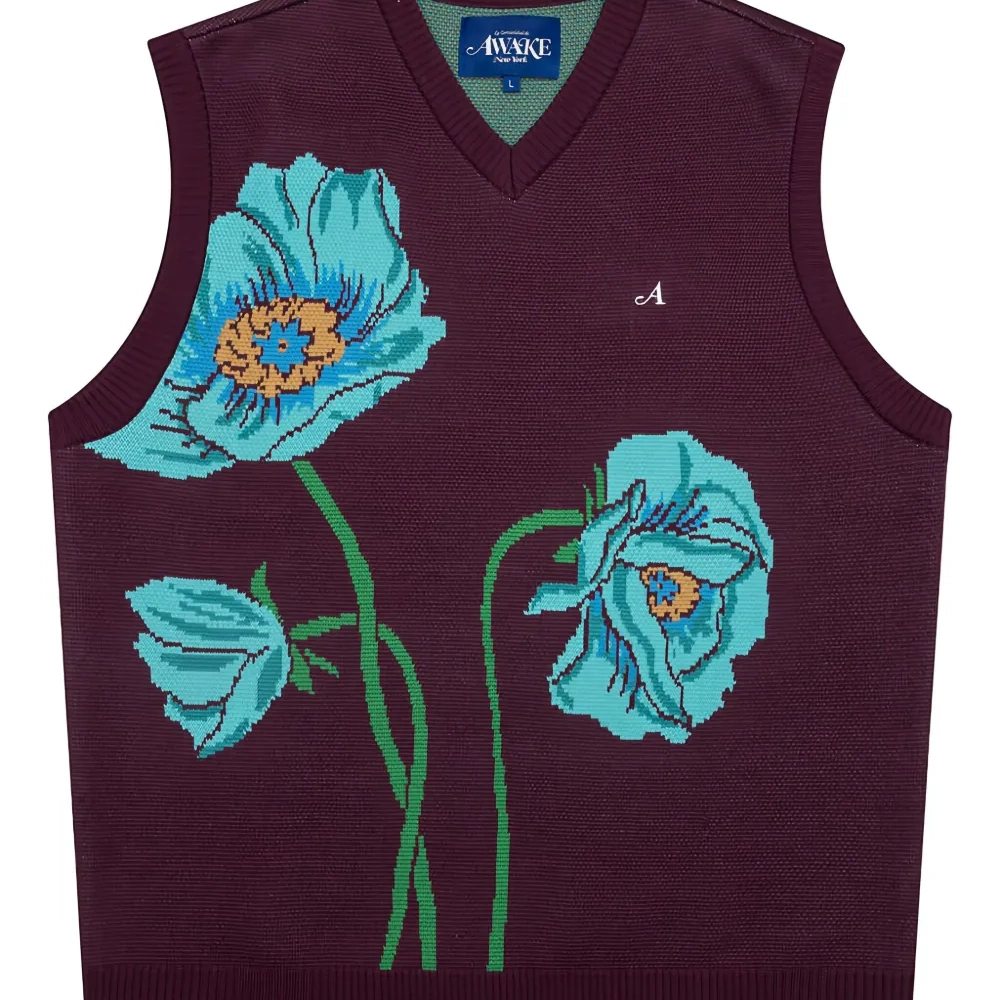 Жилет вязки интарсия с цветочным узором