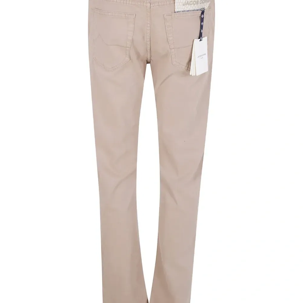 Брюки с вышивкой и карманами Брюки с вышивкой и карманами