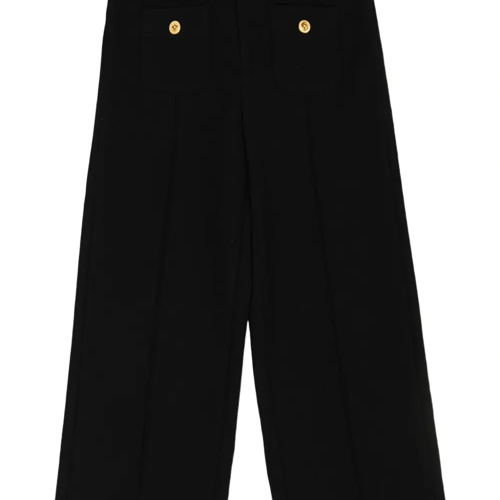 Брюки с пуговицами