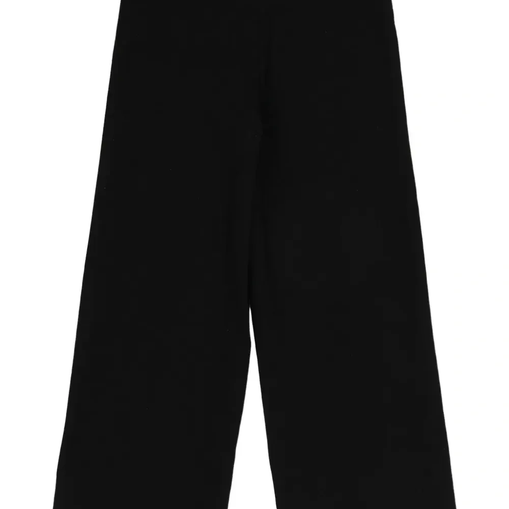 Брюки с пуговицами