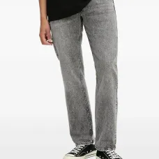 Джинсы из вареного денима