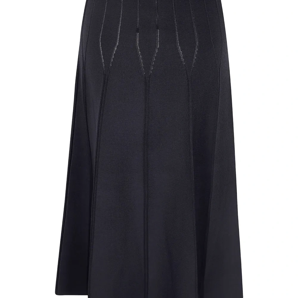 Трикотажная юбка миди в рубчик Трикотажная юбка миди в рубчик