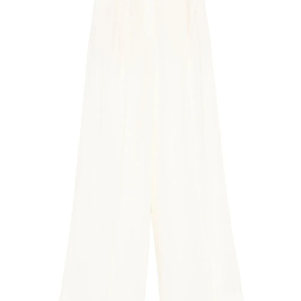 Широкие брюки со складками