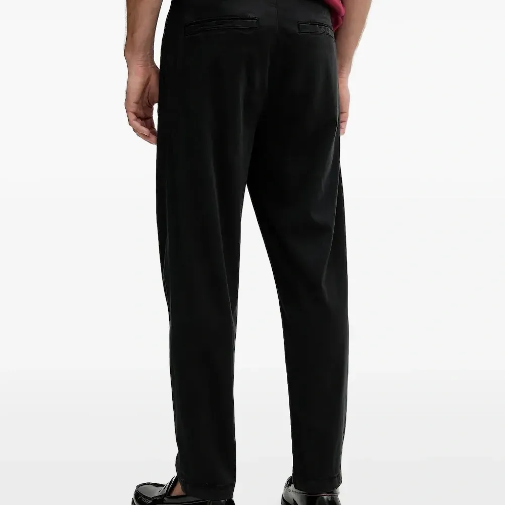 Брюки с вышивкой и карманами Брюки с вышивкой и карманами