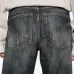 Джинсы с эффектом потертости
