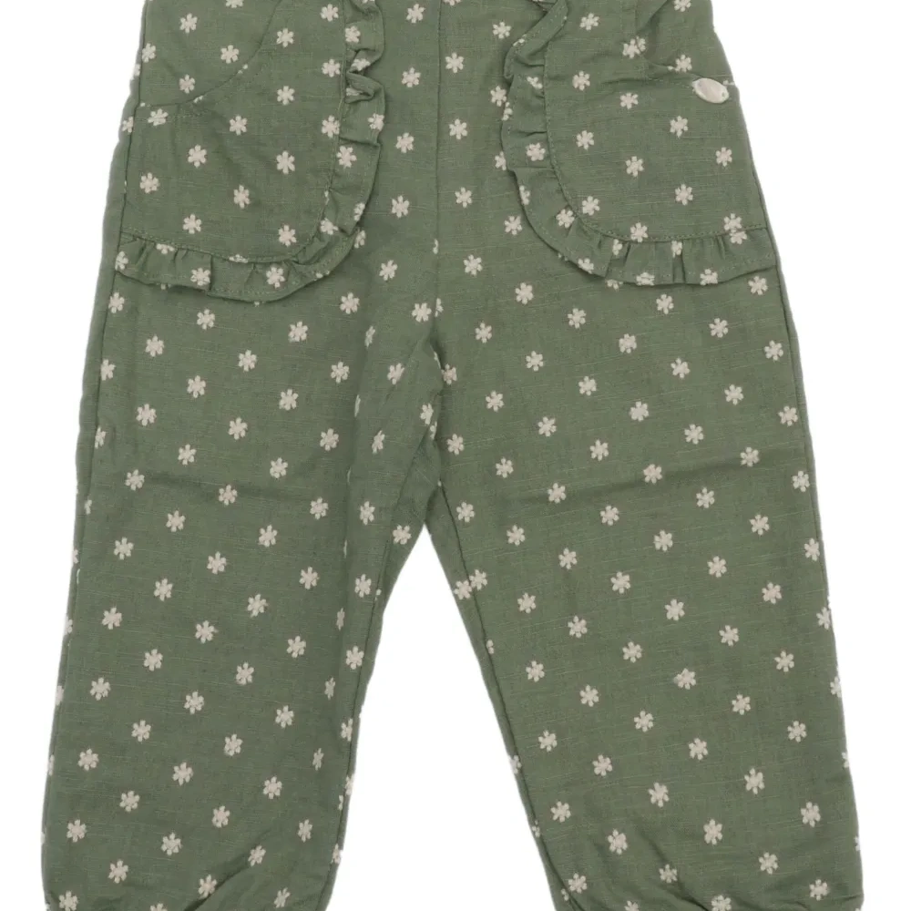 Брюки с оборками и цветочным принтом