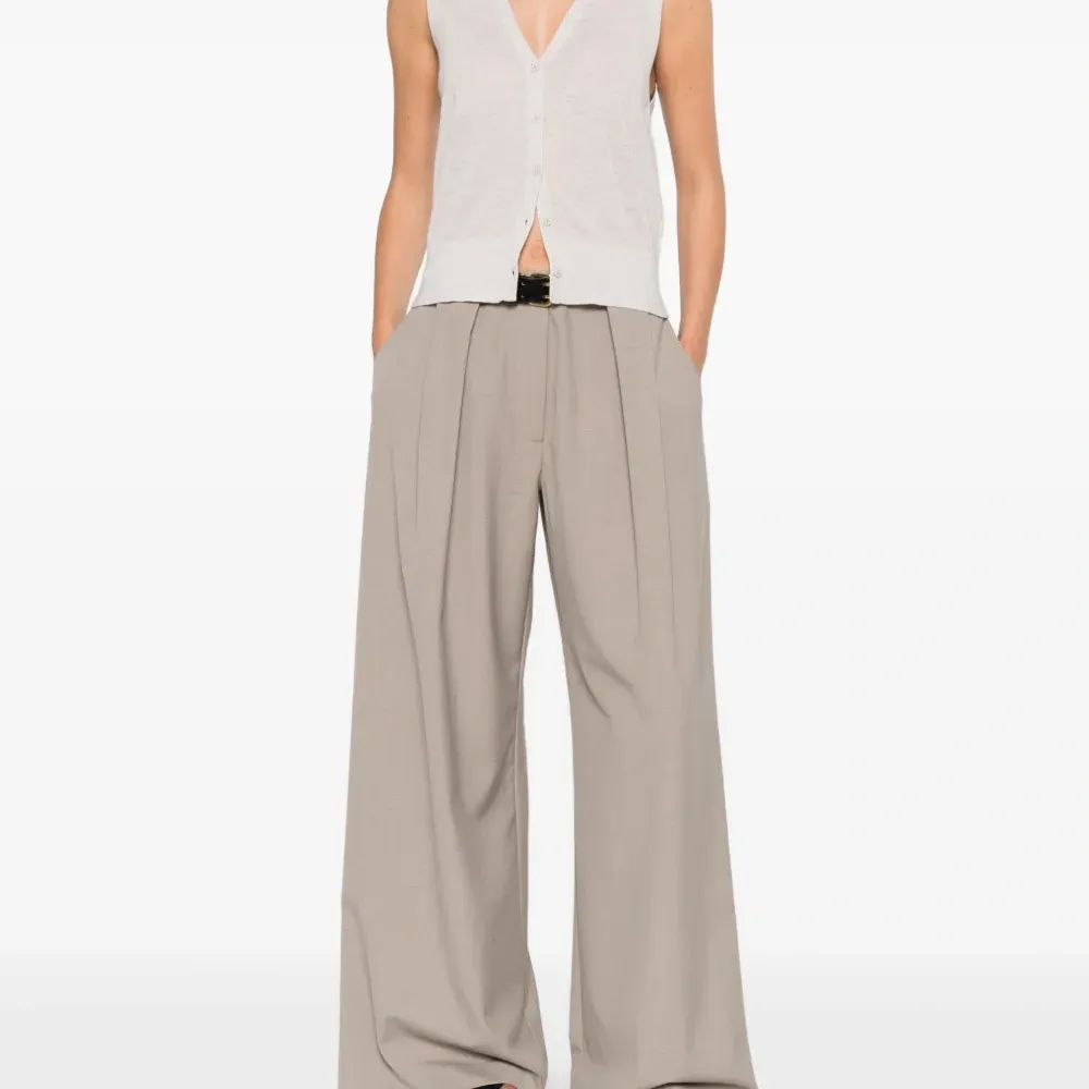 Жилет на пуговицах