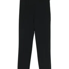 Узкие брюки строгого кроя Узкие брюки строгого кроя