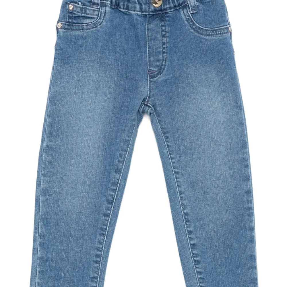 Джинсы с пятью карманами