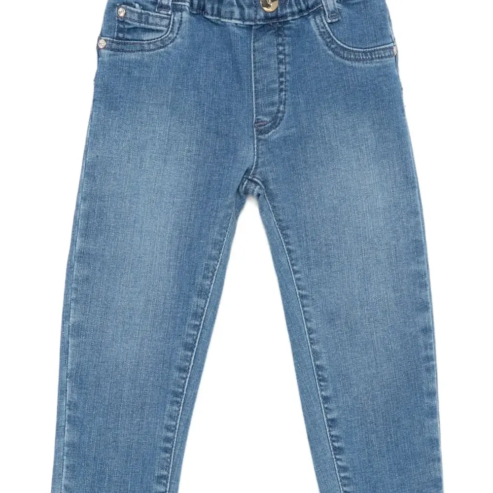 Джинсы с пятью карманами