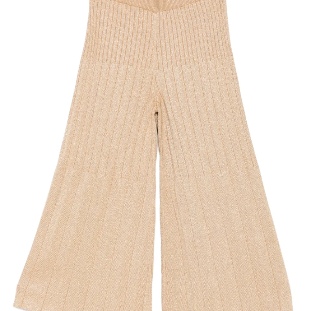 Расклешенные брюки в рубчик