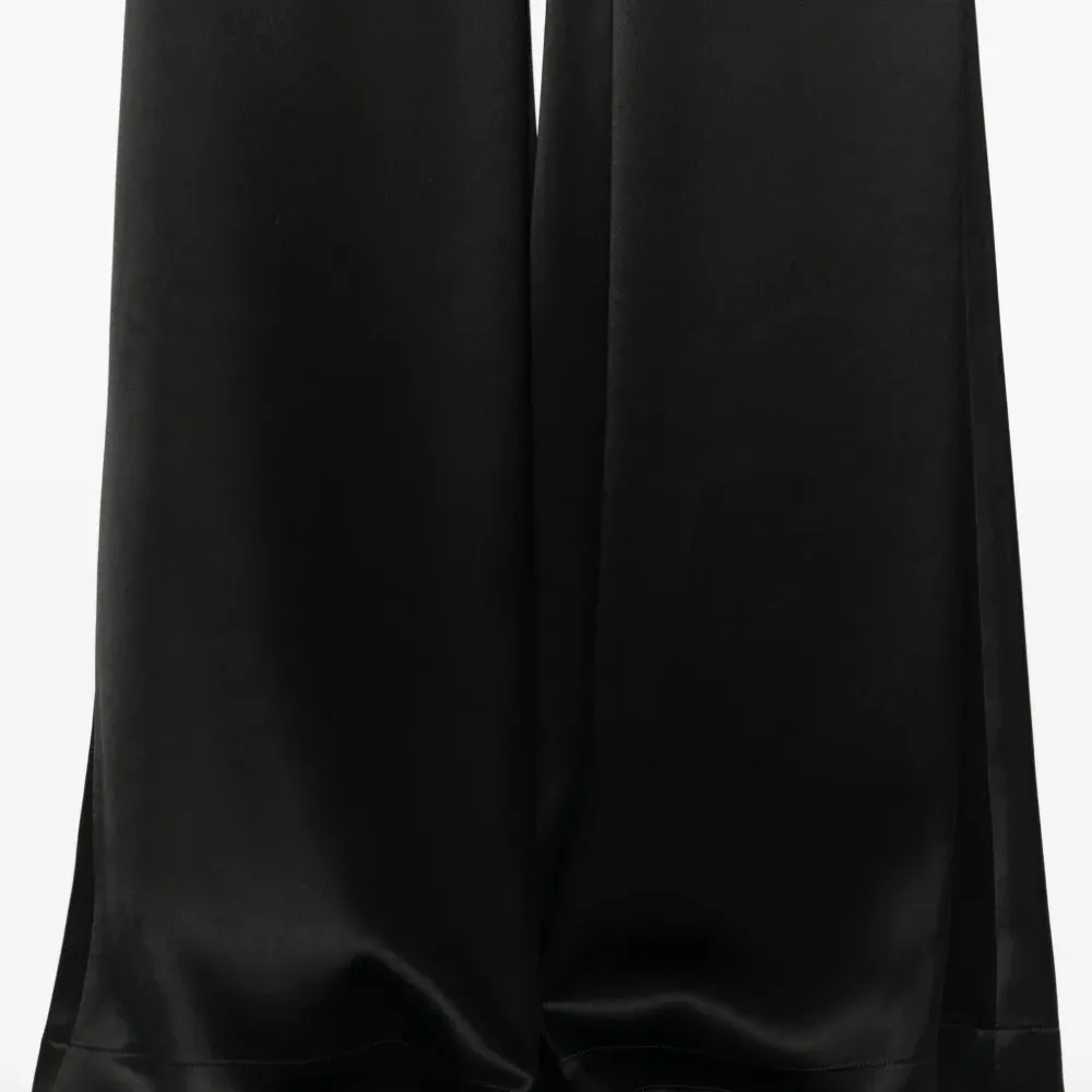 Брюки широкого кроя с эластичным поясом Брюки широкого кроя с эластичным поясом