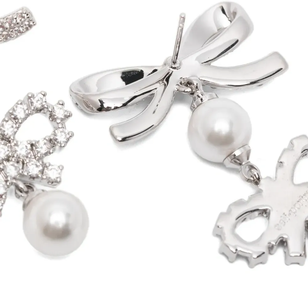 Серьги с двойным бантом и жемчужной подвеской