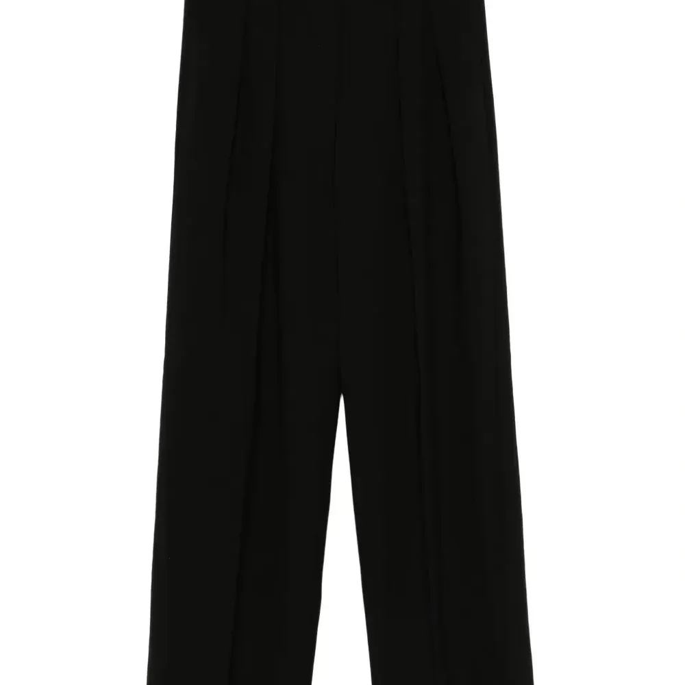 Плиссированные брюки