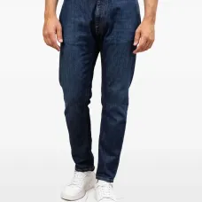 Джинсы с эффектом потертости Джинсы с эффектом потертости