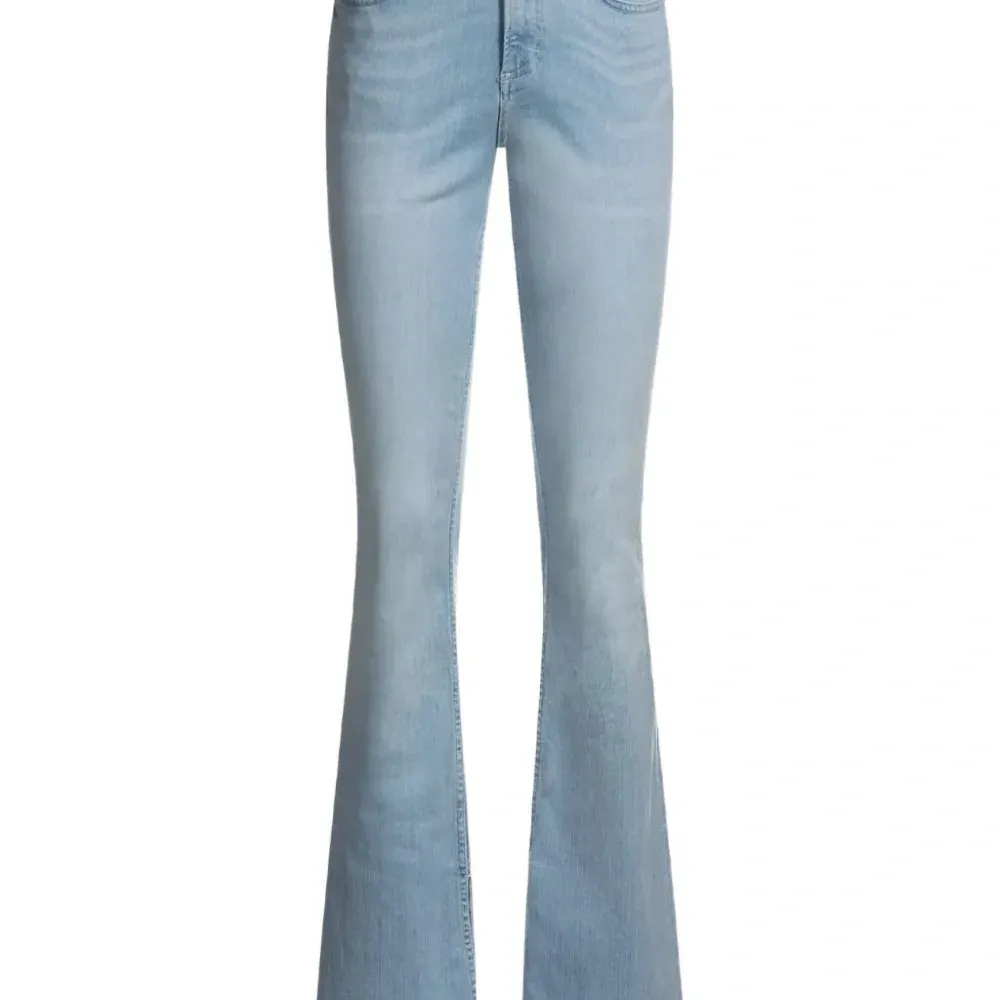 Расклешенные брюки с разрезами