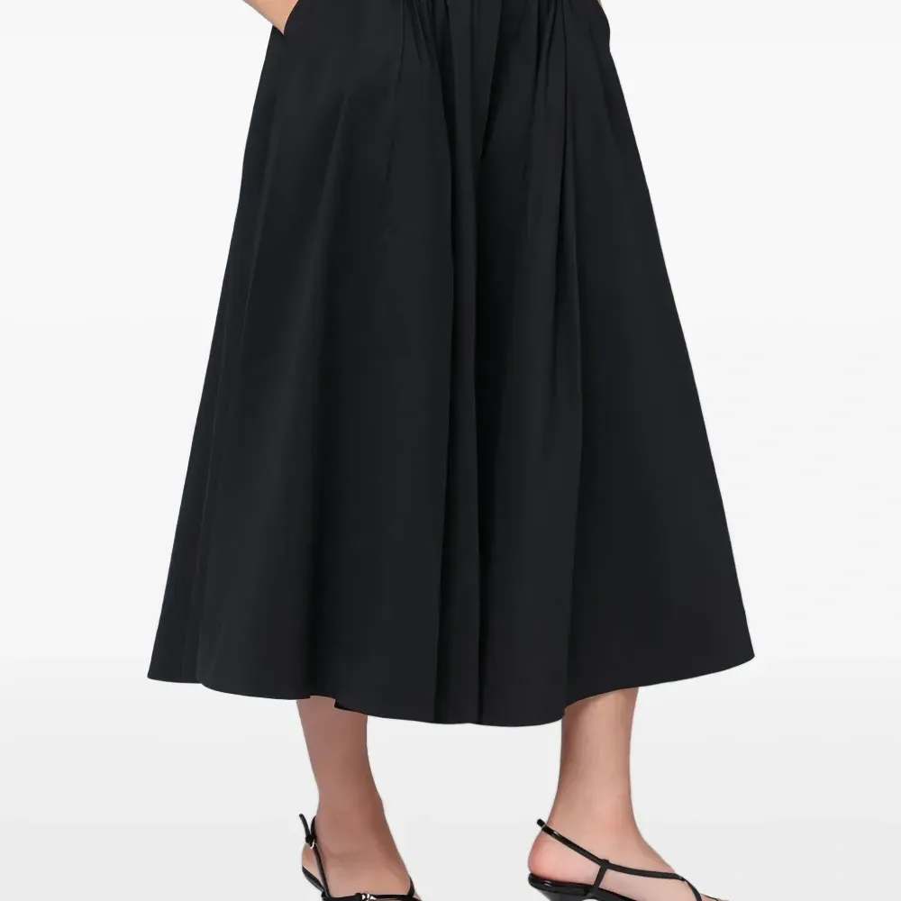 Плиссированная юбка с карманом