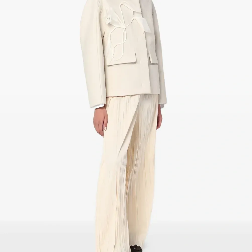 Плиссированные брюки