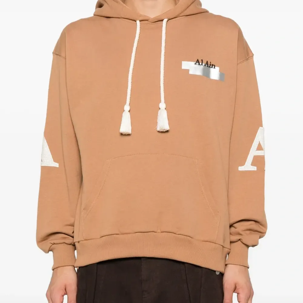 Худи с кисточками