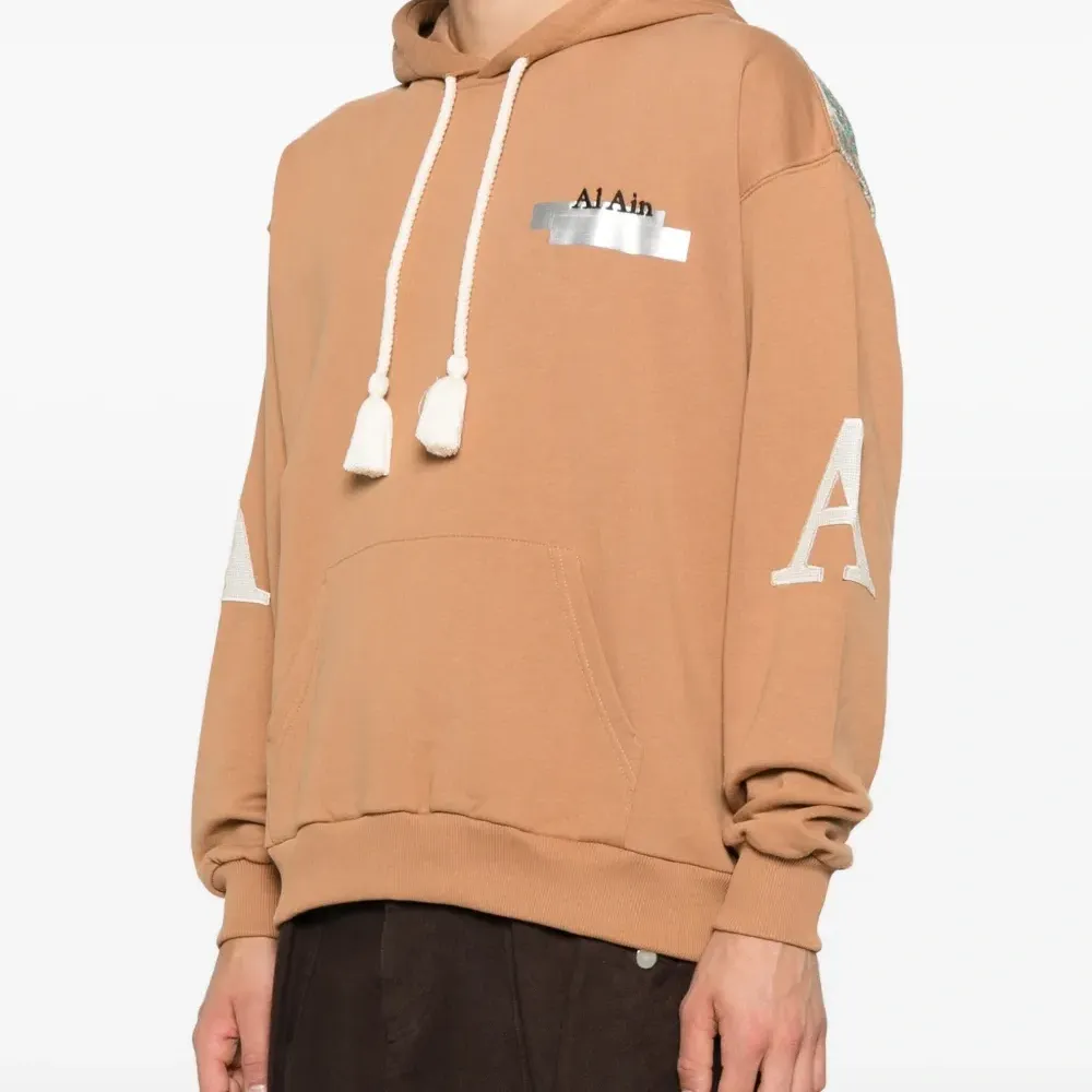 Худи с кисточками