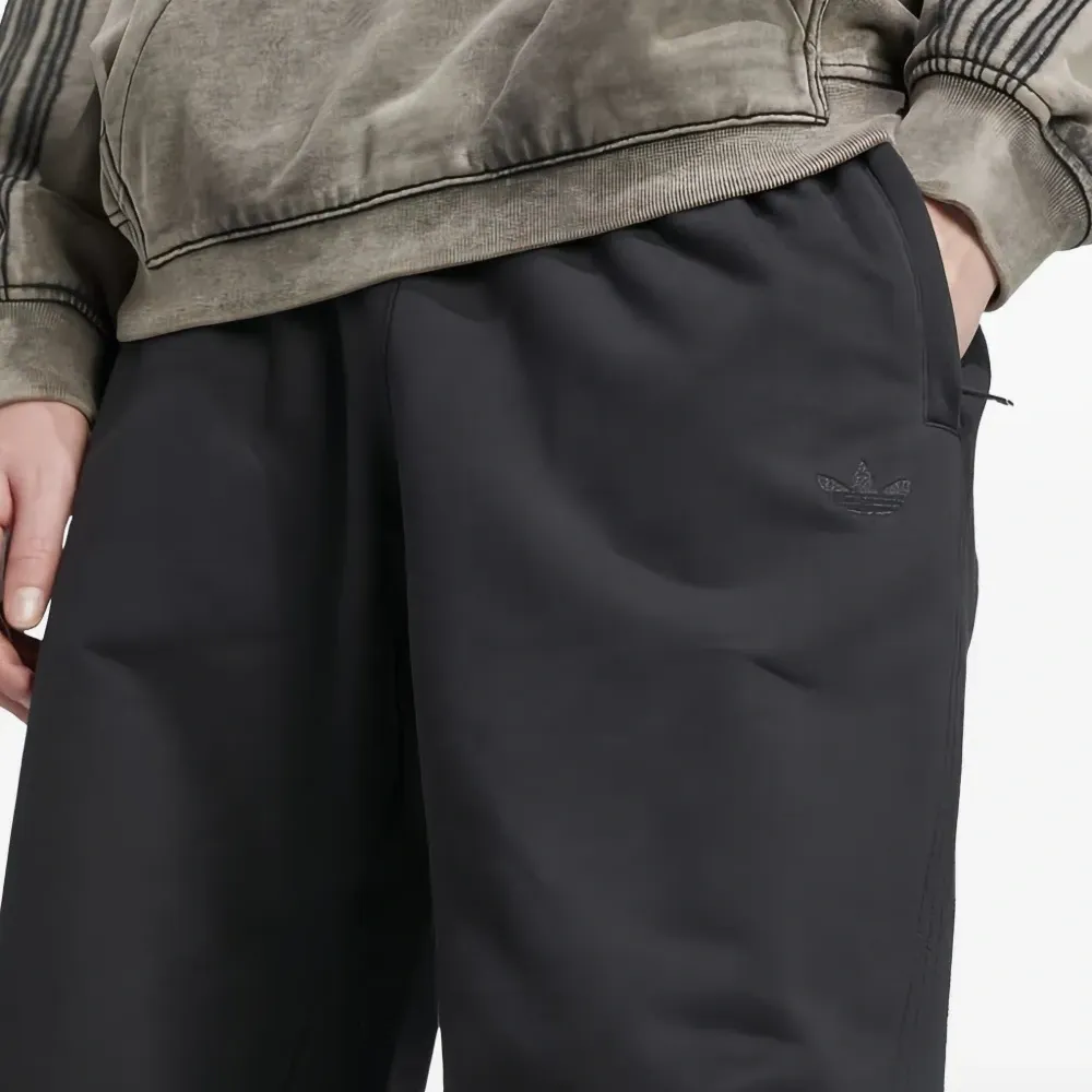 Брюки с лампасами и вышитым логотипом