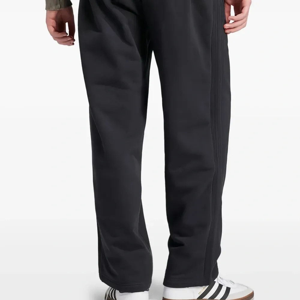 Брюки с лампасами и вышитым логотипом