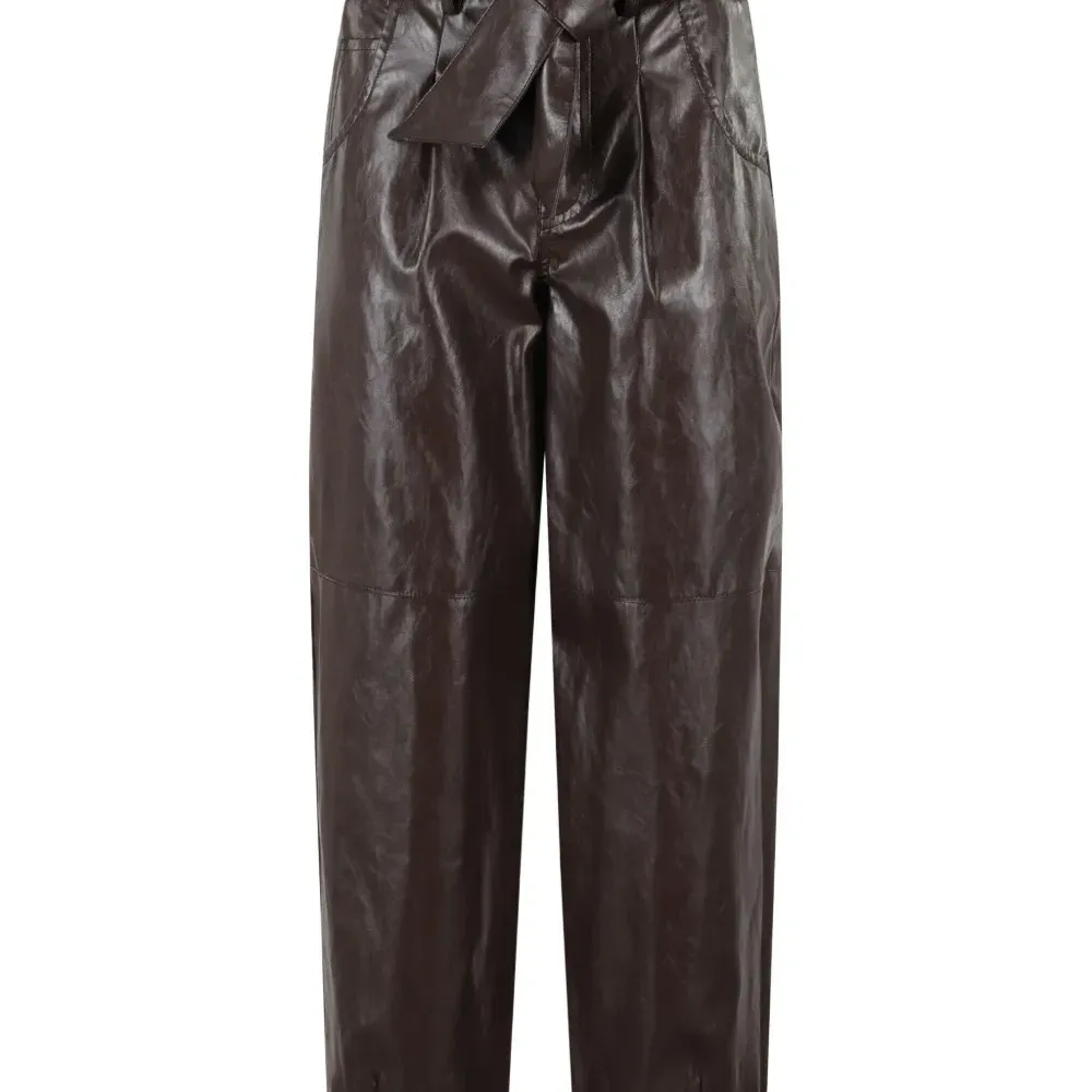 Зауженные брюки с бантом