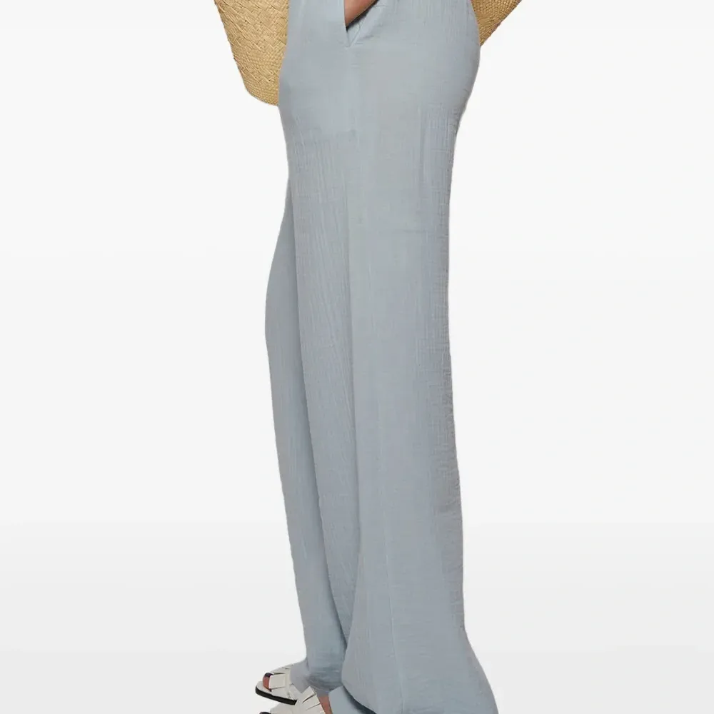 Брюки широкого кроя на завязке