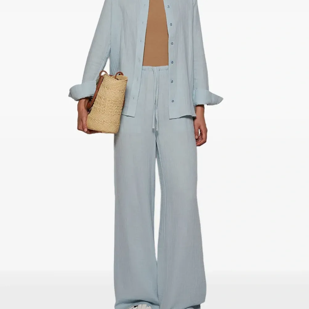 Майка с высоким воротом в рубчик