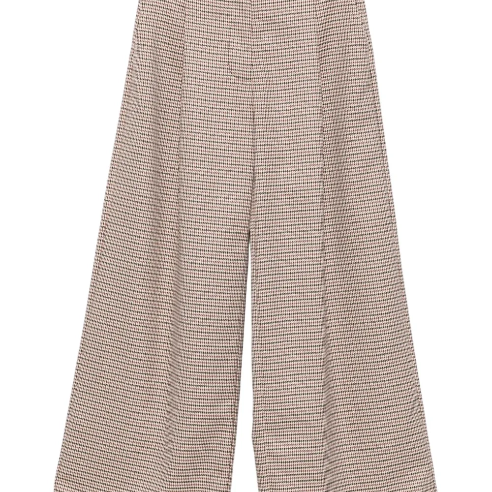 Брюки в ломаную клетку