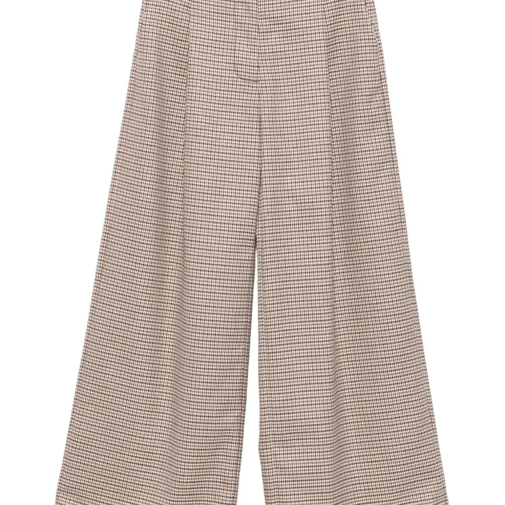 Брюки в ломаную клетку