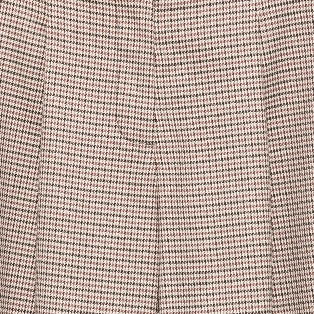 Брюки в ломаную клетку