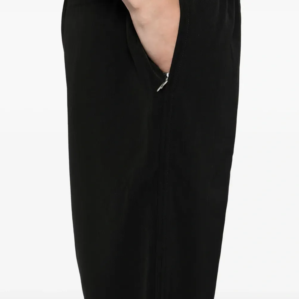 Спортивные брюки с кантом