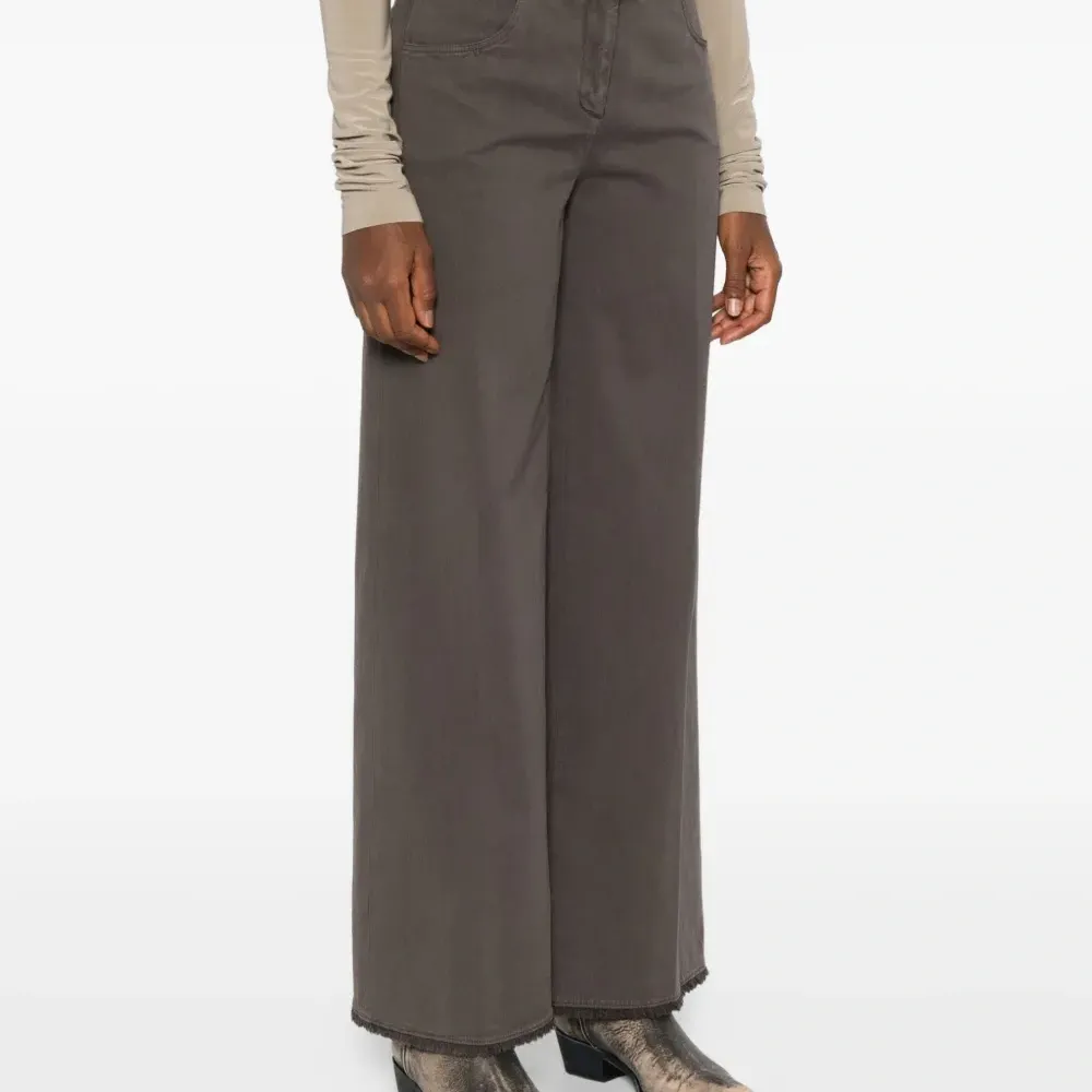 Брюки с бахромой Брюки с бахромой